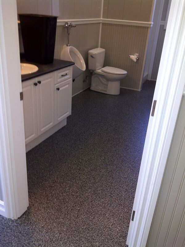 Polyaspartic flooring installed in a washroom.